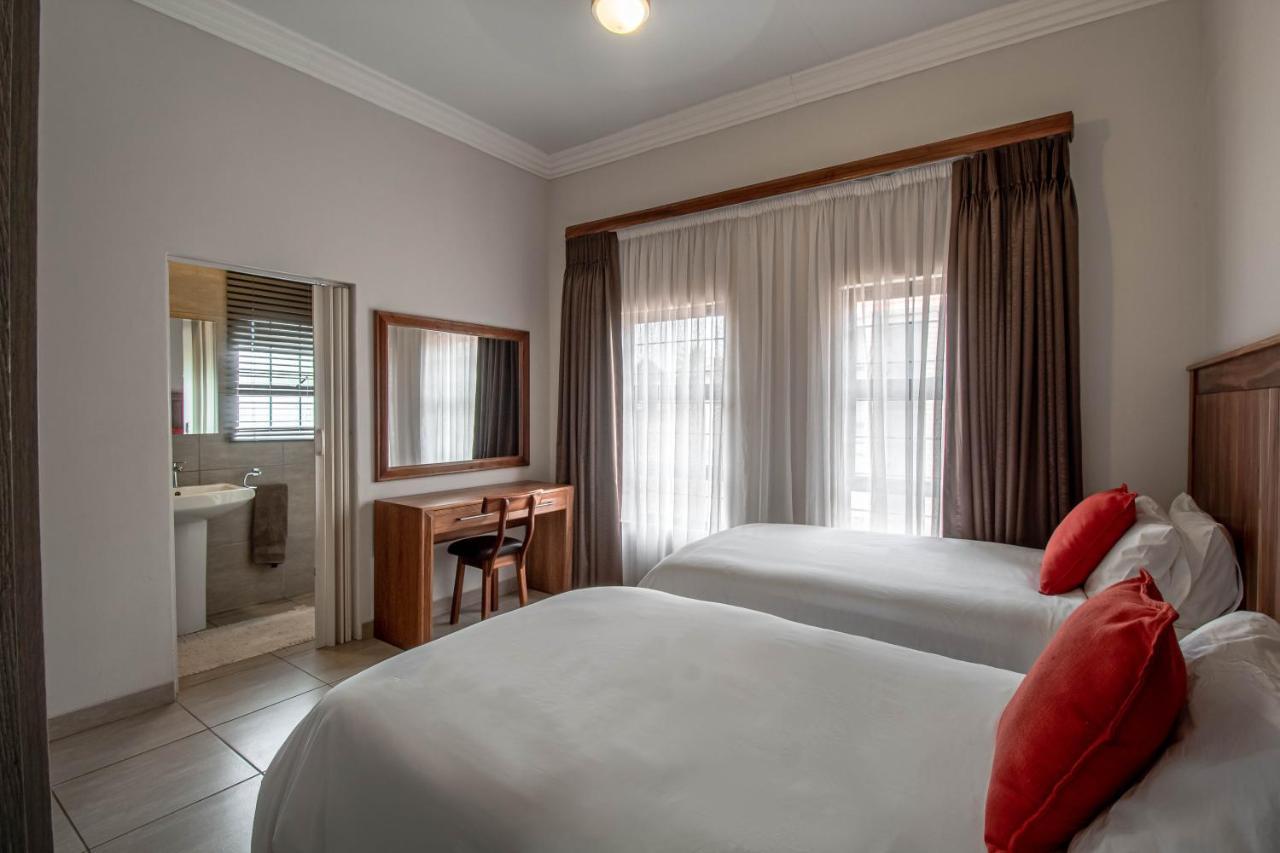 Camelot Guest House & Apartments Potchefstroom Exterior photo